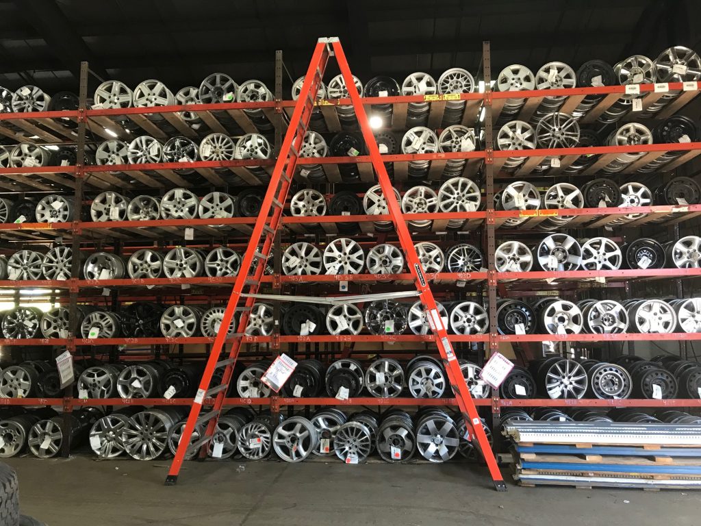 Car rims in warehouse